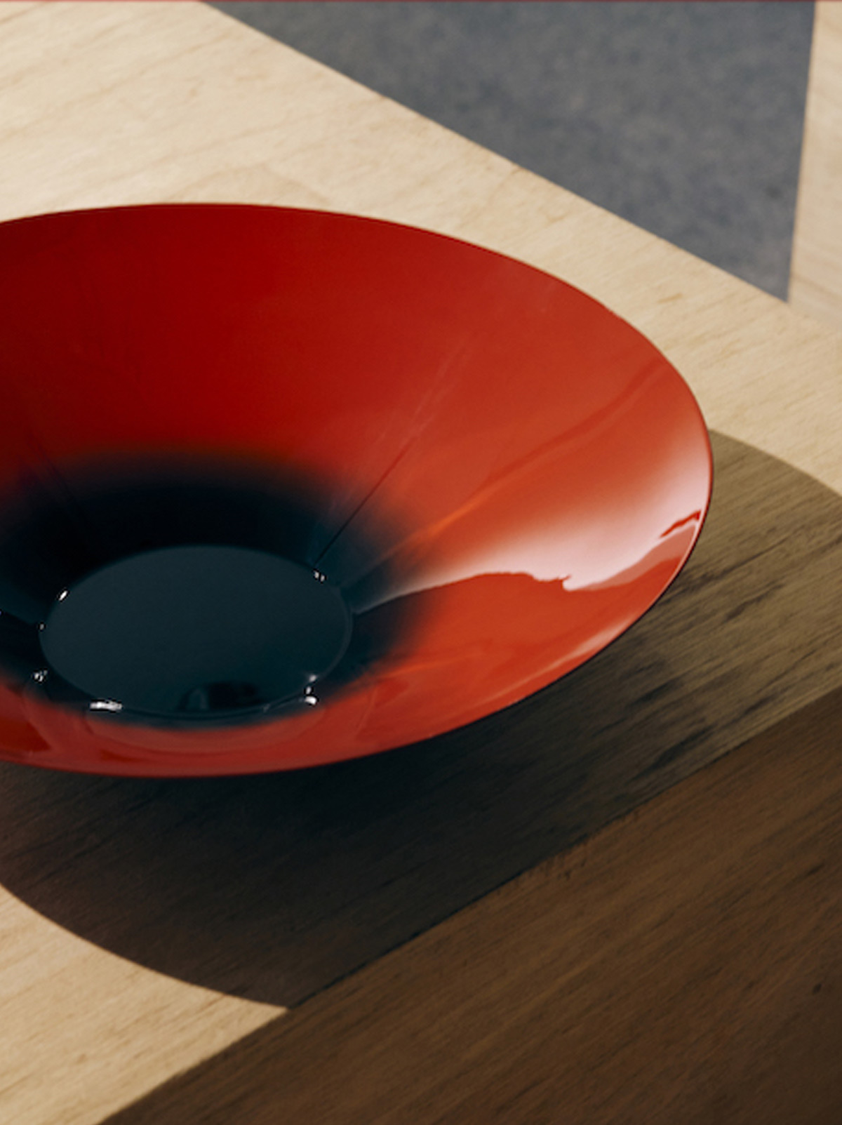 A finished bowl in red urushi lacquer